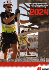 Person i hjälm som jobbar.